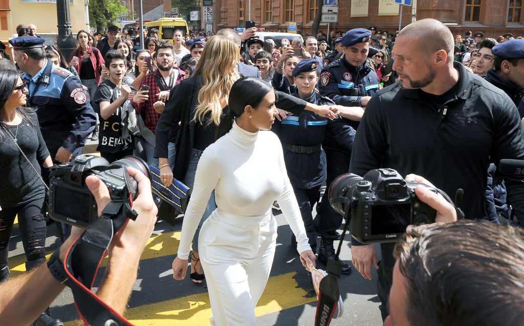 Kim Kardashian With Cutout of Rob Kardashian's Face