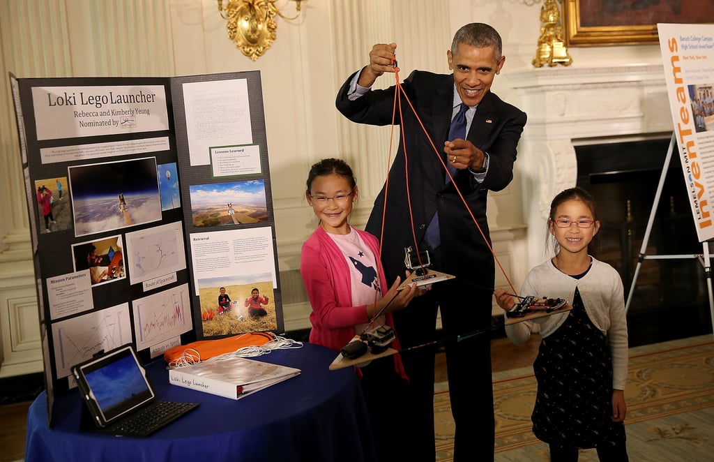 President Obama tried out a project created by Rebecca and Kimberly Yeung. The sisters are from Seattle, WA, and built a homemade spacecraft out of arrows and wood scraps before launching it into the stratosphere with a helium balloon.