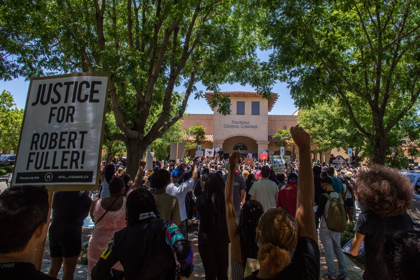 People protest in front of Palmdale Sheriffs Station on June 13, 2020 to demand a full investigation into the death of Robert Fuller, a 24-year-old black man found hanging from a tree, in Palmdale, California. - Protesters blasted city and sheriff's offic