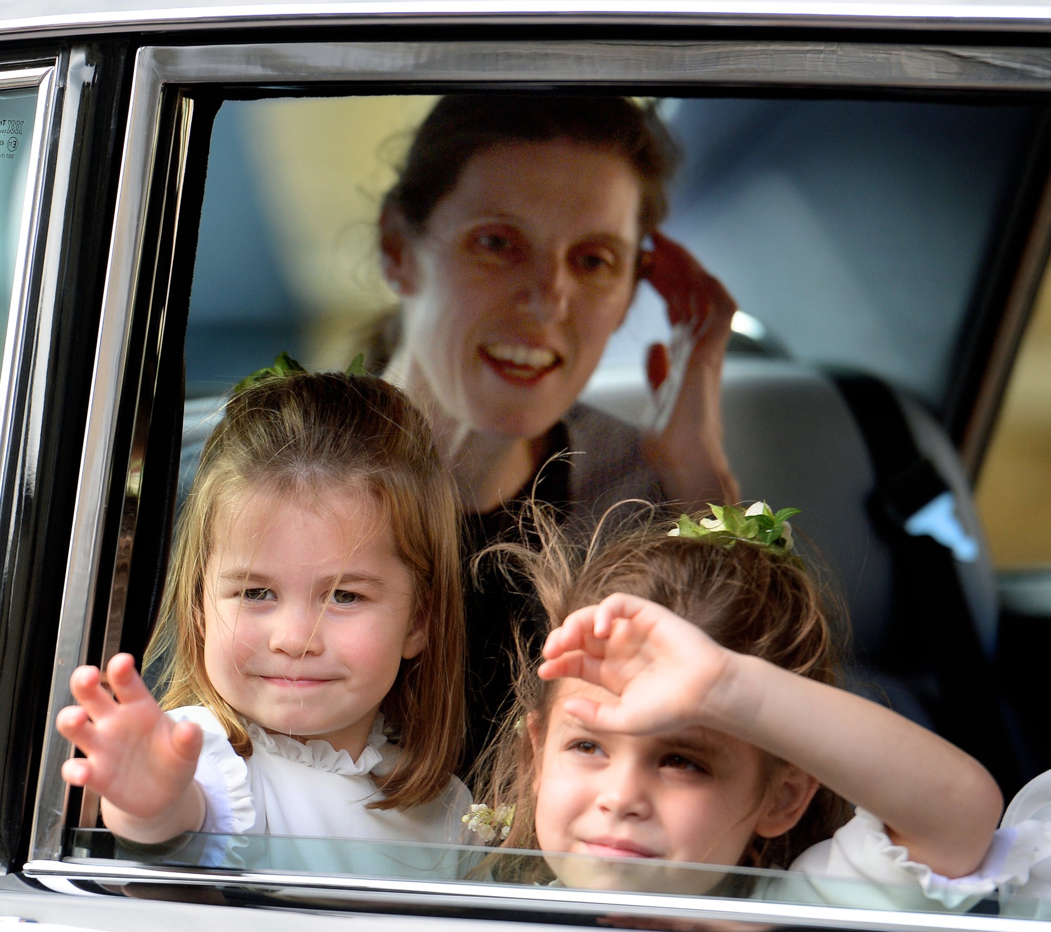 WINDSOR, UNITED KINGDOM - OCTOBER 12: (EMBARGOED FOR PUBLICATION IN UK NEWSPAPERS UNTIL 24 HOURS AFTER CREATE DATE AND TIME) Princess Charlotte of Cambridge and Theodora Williams, (accompanied by Princess Charlotte's nanny Maria Teresa Turrion Borrallo) attend the wedding of Princess Eugenie of York and Jack Brooksbank at St George's Chapel on October 12, 2018 in Windsor, England. (Photo by Pool/Max Mumby/Getty Images)