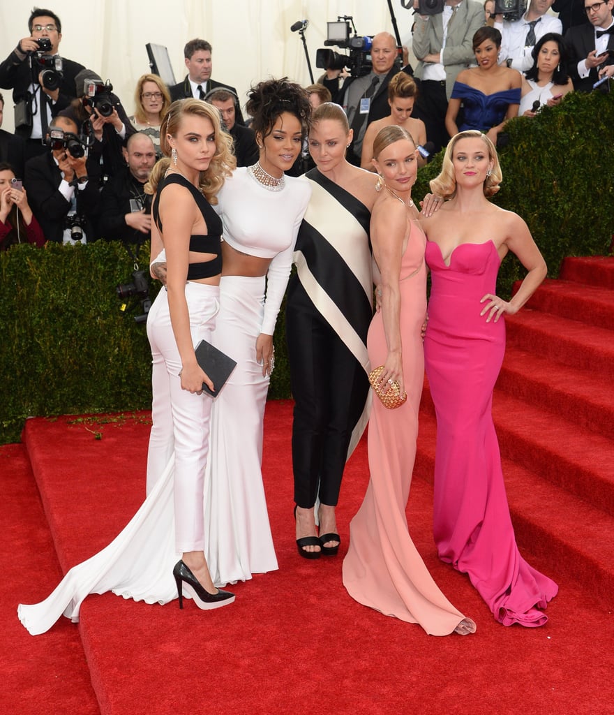 The 2014 Met Gala got a dose of girl power when Cara Delevingne, Rihanna, Stella McCartney, Kate Bosworth, and Reese Witherspoon posed arm in arm.
