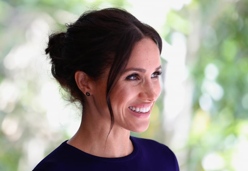 Meghan Markle's Messy Buns and Freckles Peeking Through