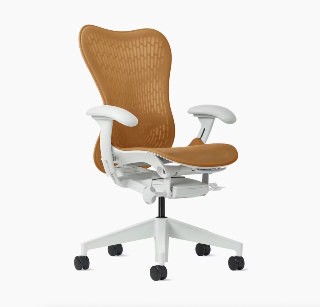 Herman Miller Mirra 2 Chair ($1,800)
I've gone 34 years without getting a proper ergonomic office chair for myself (I know). Herman Miller has mastered the art of not only the ergonomics of office chairs, but also the timeless style of them. I love the clean white structure paired with the warm, rust-like color, and I can't wait to drape a throw over the back of it for the chilly fall days ahead.