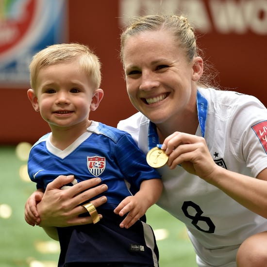 Amy Rodriguez and Son After World Cup Win