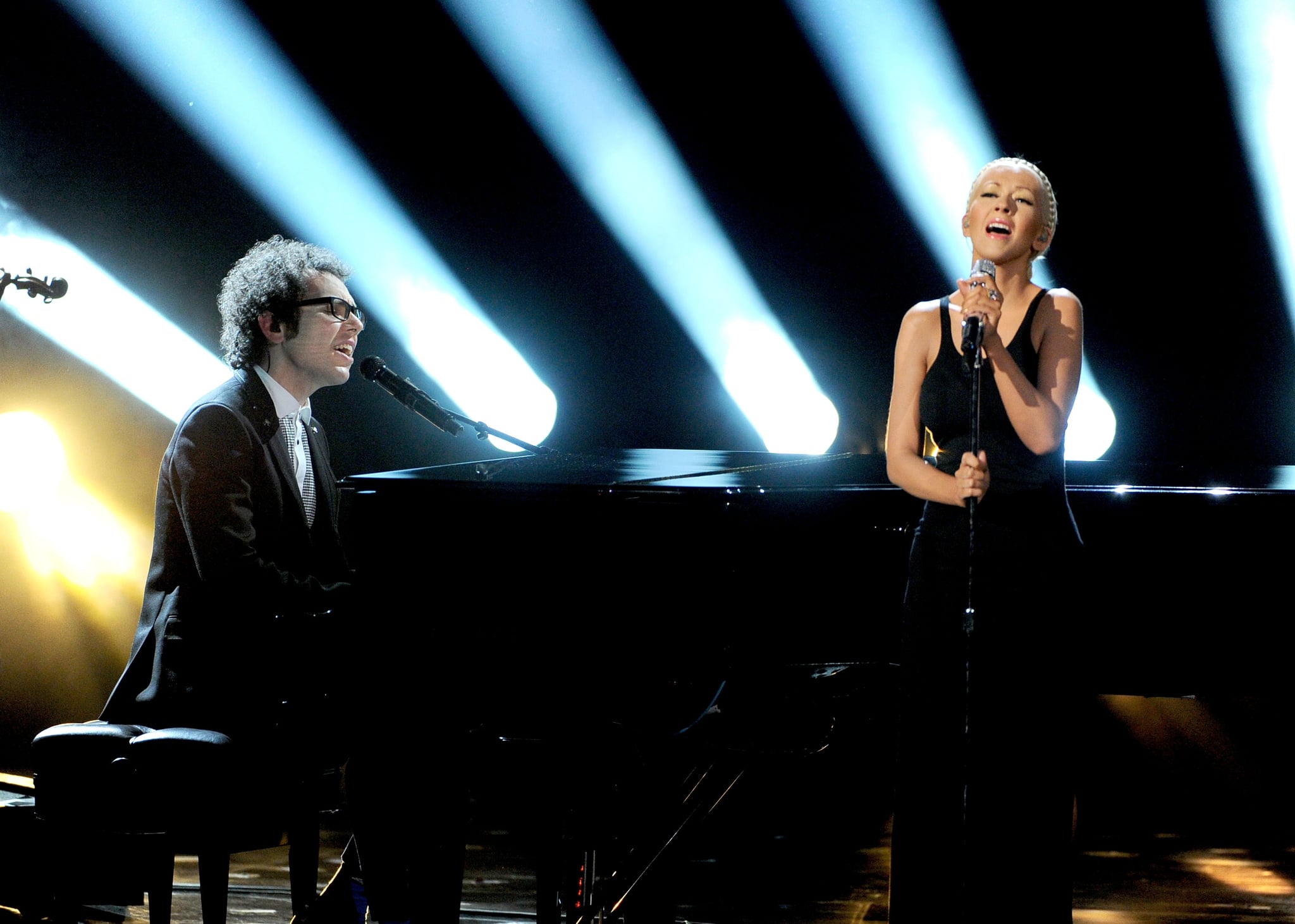 LOS ANGELES, CA - NOVEMBER 24:  Musician Ian Axel of A Great Big World (L) and singer Christina Aguilera perform onstage during the 2013 American Music Awards at Nokia Theatre L.A. Live on November 24, 2013 in Los Angeles, California.  (Photo by Kevin Winter/Getty Images)