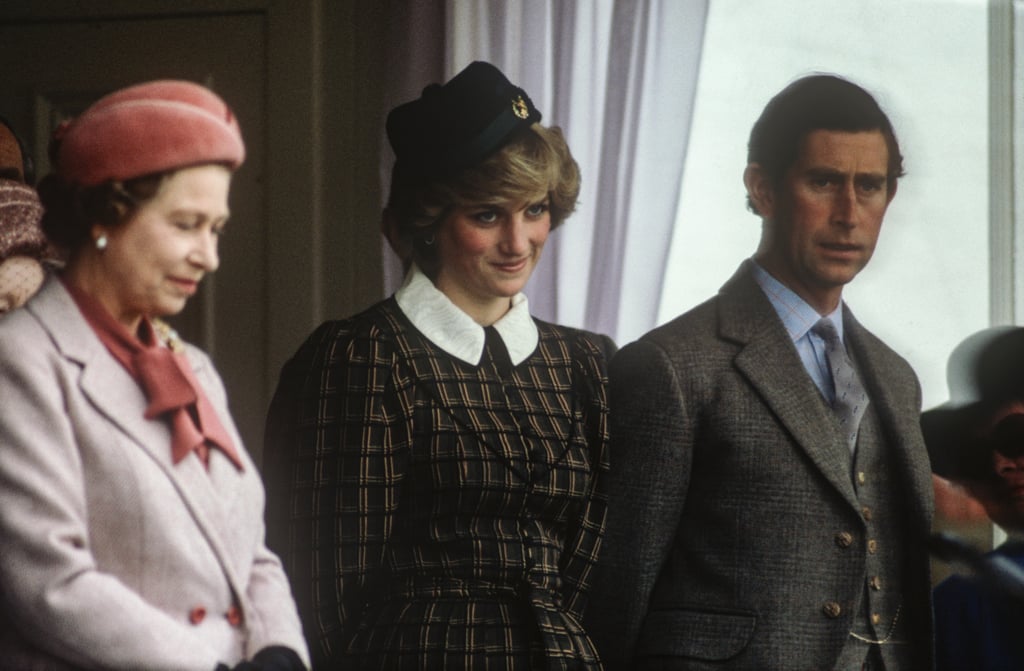 Her Majesty and Princess Diana watch the Braemar Games in Scotland alongside Prince Charles in 1982.