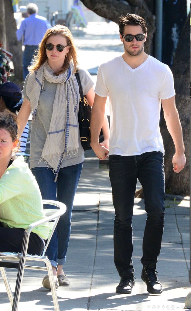 Emily VanCamp and Joshua Bowman held hands on Monday while walking around LA.