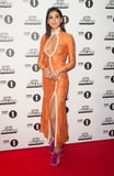 Dua Lipa’s Orange Gown Has the Most Dramatic Thigh-High Slit