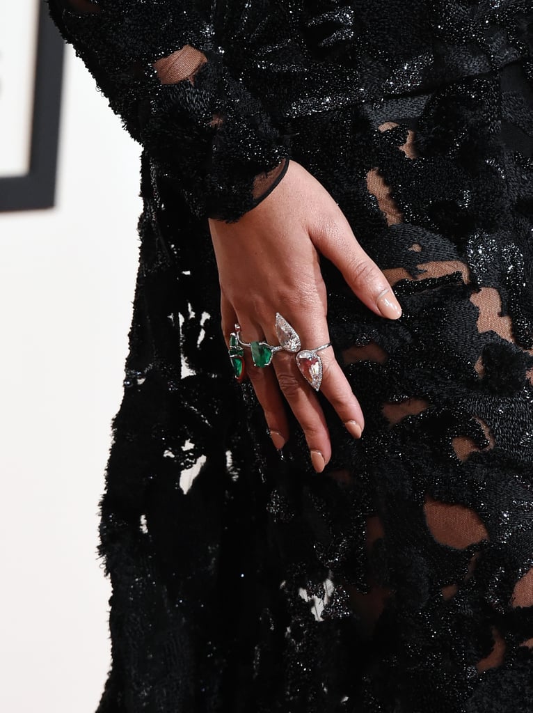 Beyoncé's stunning Lorraine Schwartz rings gave her outfit an ethereal vibe, sprinkling it with emerald pops of color.