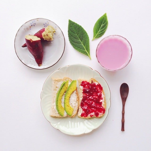 Here's a breakfast worthy of fueling a workout: cream cheese and avocado toast, raspberry jam toast, and a steamed sweet potato.