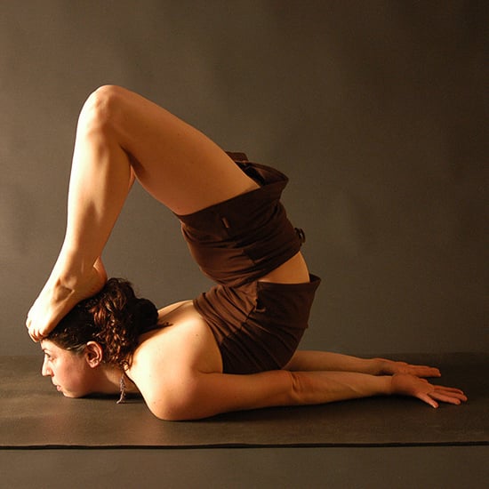 Advanced yoga poses. Young woman practicing Yoga pose. Woman