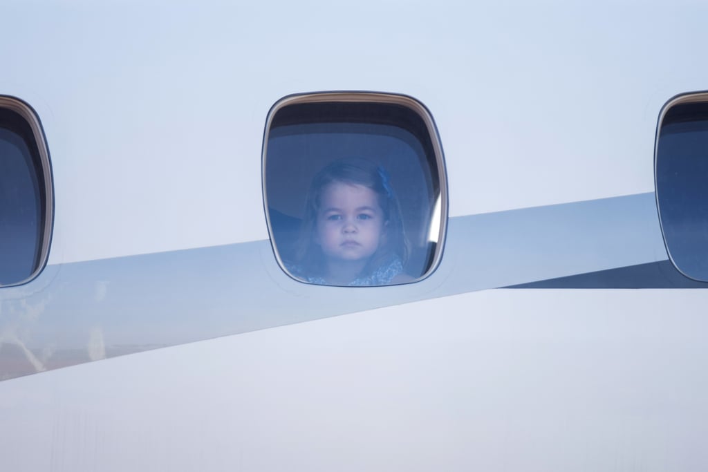 George and Charlotte Looking Out of Plane Windows Pictures