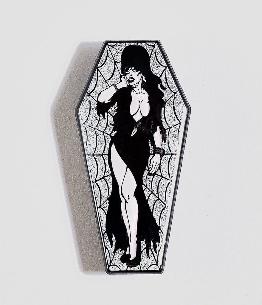 Silver Glitter Elvira Coffin Enamel Pin ($12)