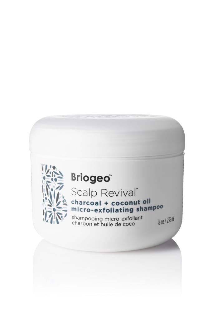 The Feel
It's a far cry from a traditional pearlescent liquid squeezed from a shampoo bottle and worked into a foamy, sudsy lather. Instead, this thick, mask-like cream is scooped from a tub and feels gritty, thanks to tiny vegetable-derived micro exfoliators that help to gently buff away product buildup and dead skin at the scalp. The bits are fine, so it feels more massaging than irritating as you scrub, and they dissolve as they buff so you aren't left with little particles in your hair. 
The dark gray cream gets its color from Binchotan charcoal, which is infused in the formula to help draw out gunk from your scalp (similar to the way it does in your favorite charcoal face mask). The formula is also sulfate-free, so the frothy lather is minimal but satisfying. But the real satisfaction comes from the cooling (and slightly tingling) feeling that's attributed to a blend of tea tree, peppermint, and spearmint oils. 
Together, these oils work to reduce itchiness and scalp irritation, which is a welcome benefit for anyone who suffers from dry Winter scalp, like me. Any then there's the smell . . .
The Scent
Where to begin? If you're a lover (or obsessor) of Thin Mint Girl Scout Cookies or mint chocolate chip ice cream, this sweet chocolaty yet refreshing blend will hook you from the minute you crack open the tub. And even if you're more of a Tagalong or Lemon Cookie fan, it's almost impossible not to love this minty, fresh scent.