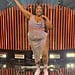 Lizzo Sparkles in a Thigh-High Slit Skirt For Tour Promo