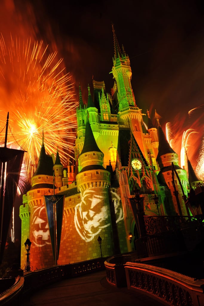 Jack-o'-lanterns light up the castle.