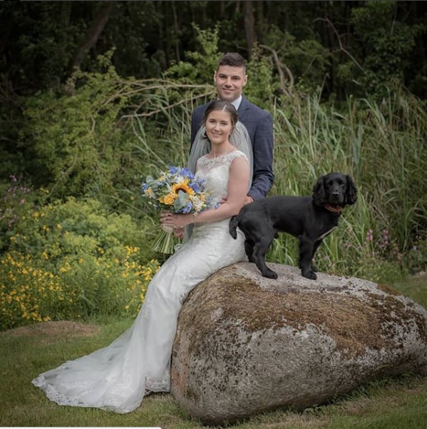 This pup knows better than to be left out of the wedding photos!