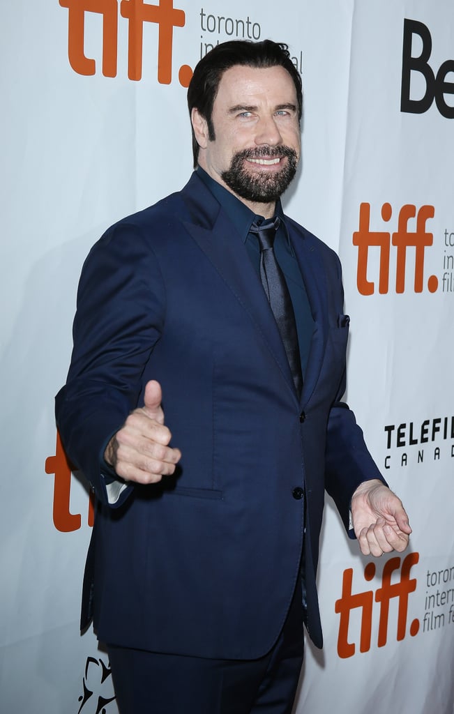 John Travolta gave a thumbs-up at the premiere of The Forger.