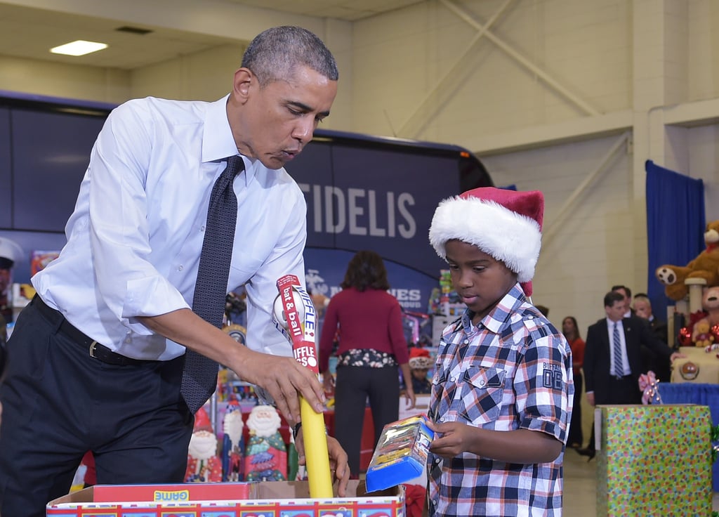Obamas at the Marine Corps Toys For Tots Event 2014