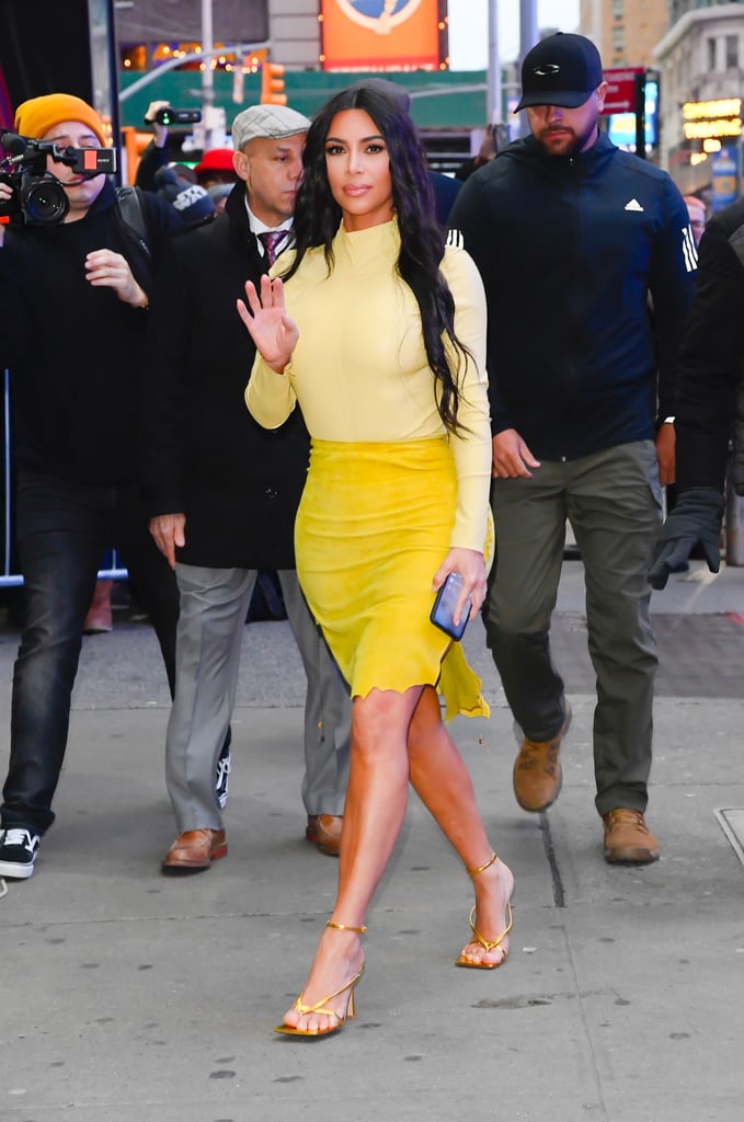 Kim Kardashian's Yellow Turtleneck and Suede Skirt in NYC