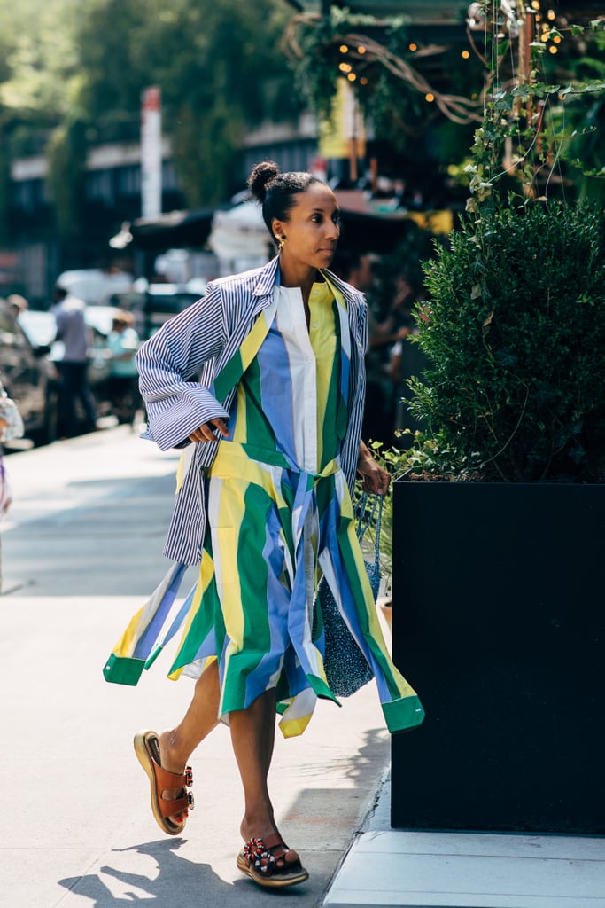 A linen colorblock dress, sturdy slides, and a top knot is effortless on a warm day.