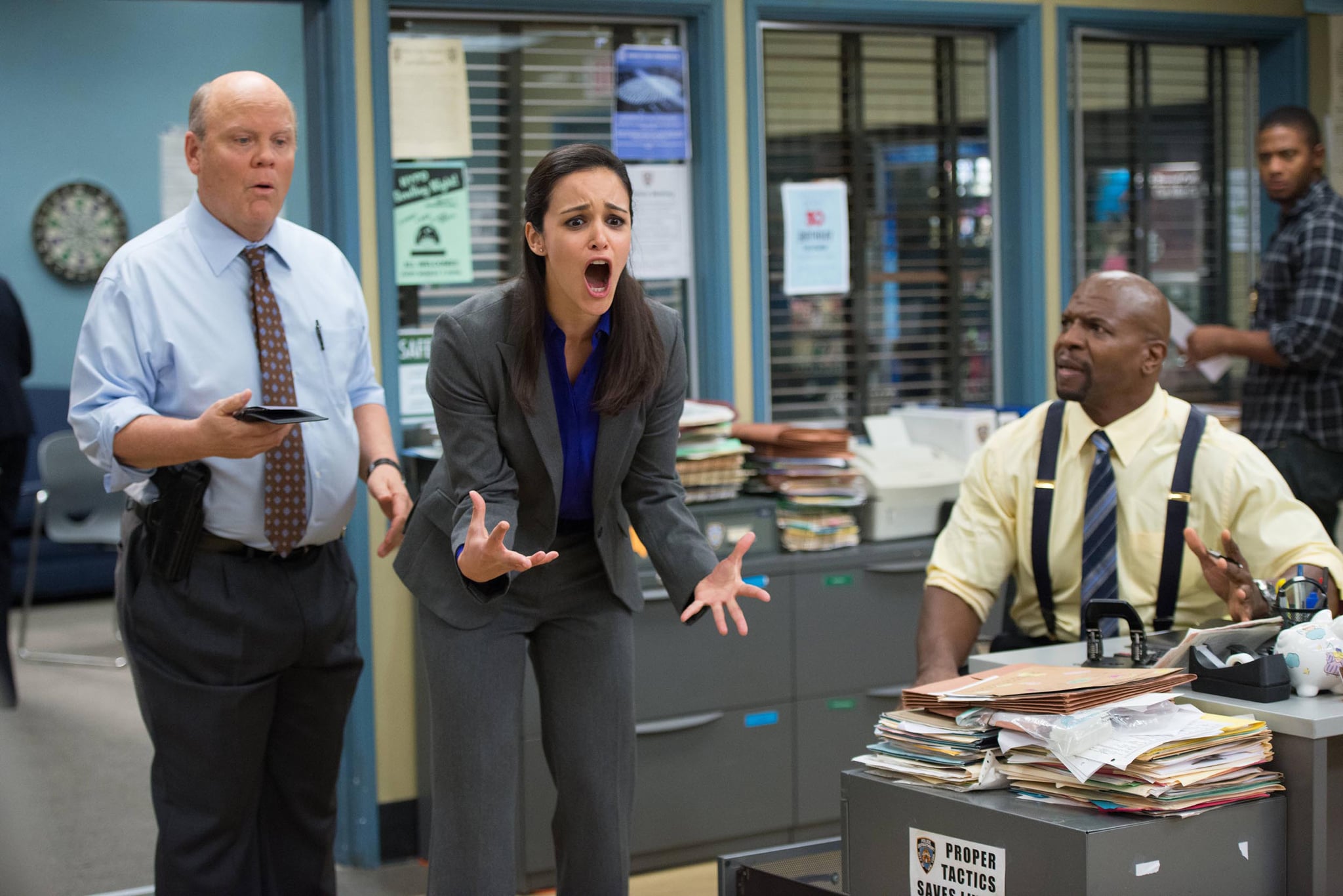 BROOKLYN NINE-NINE, (from left): Dirk Blocker, Melissa Fumero, Terry Crews, 'Fancy Brugdom', (Season 1, ep. 120, aired March 11, 2014). photo: Eddy Chen / Fox / courtesy Everett Collection