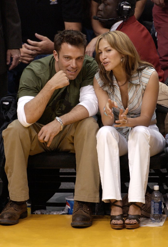 The two were super flirty at an LA Lakers game in May 2003.
