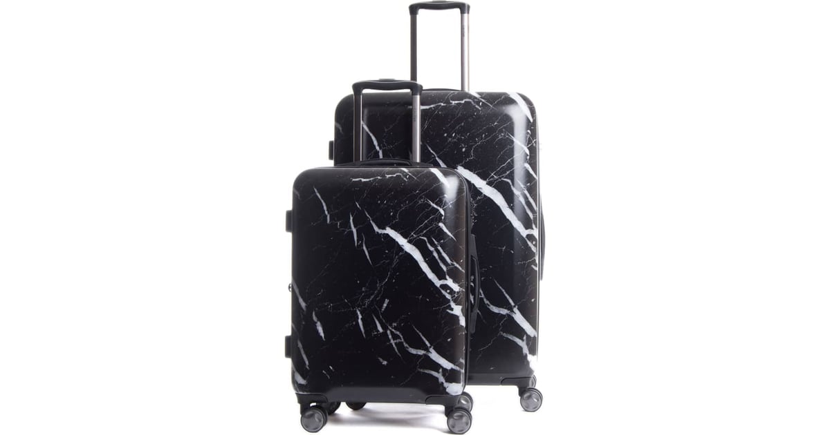 calpak 22 inch spinner