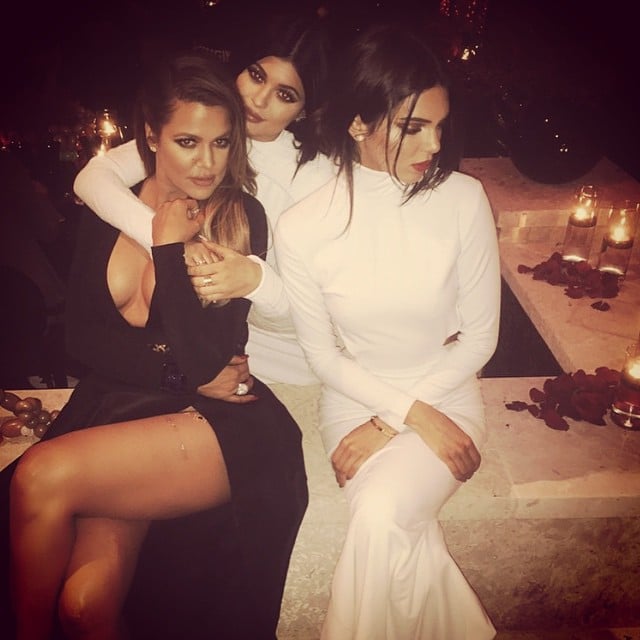 Khloé Kardashian posed with her sisters Kendall and Kylie Jenner at their mom's annual Christmas Eve party.