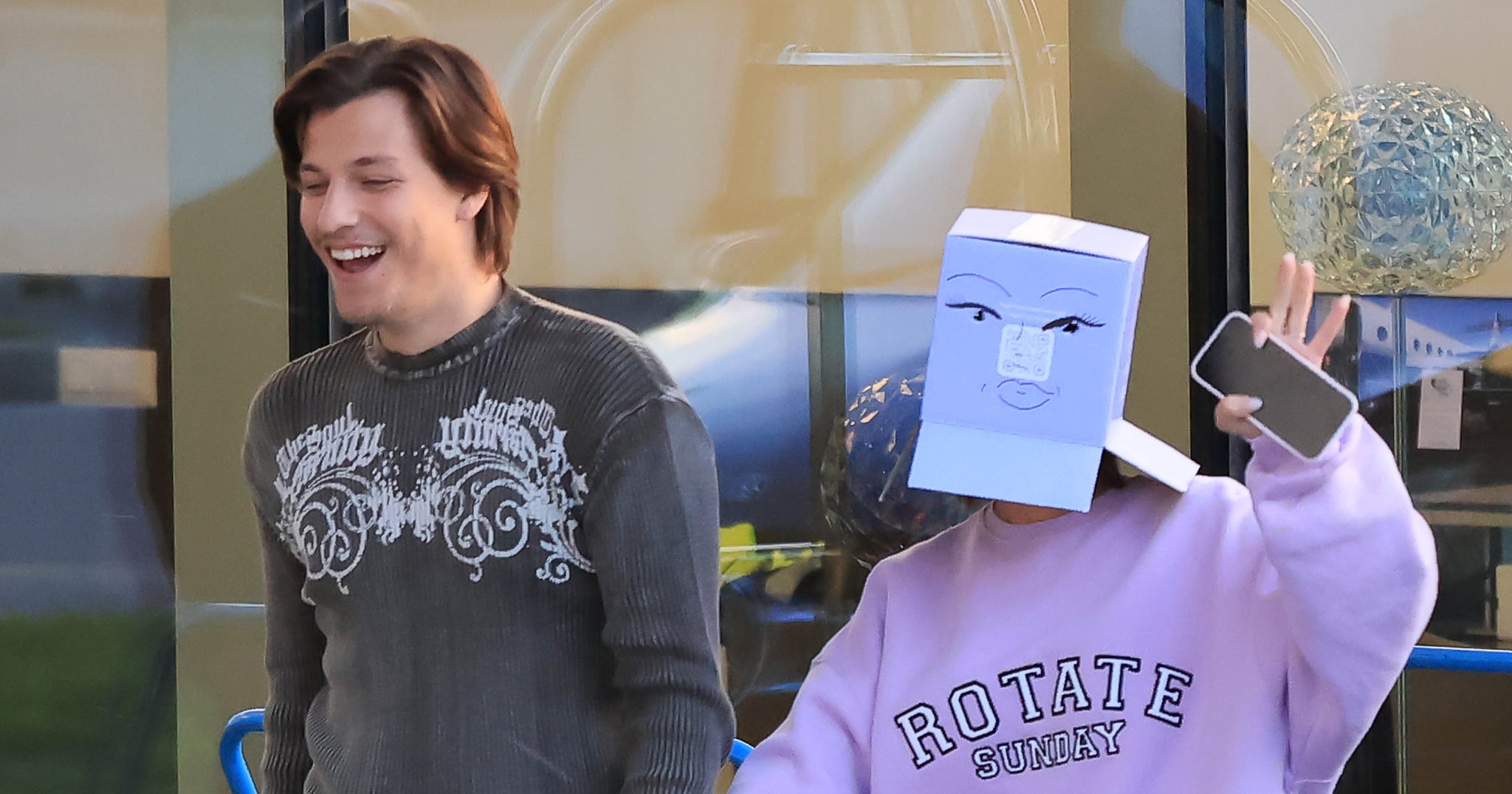 Newly Engaged Millie Bobby Brown Jokingly Wears a Cardboard Box Over Her Head