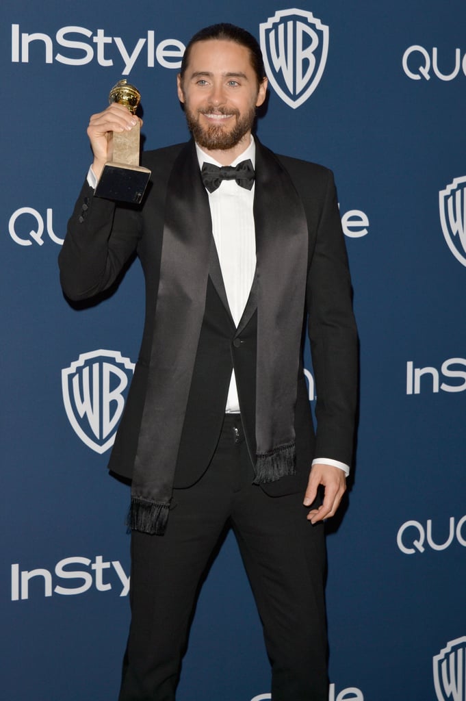 Jared Leto posed with his best supporting actor award at the InStyle bash.