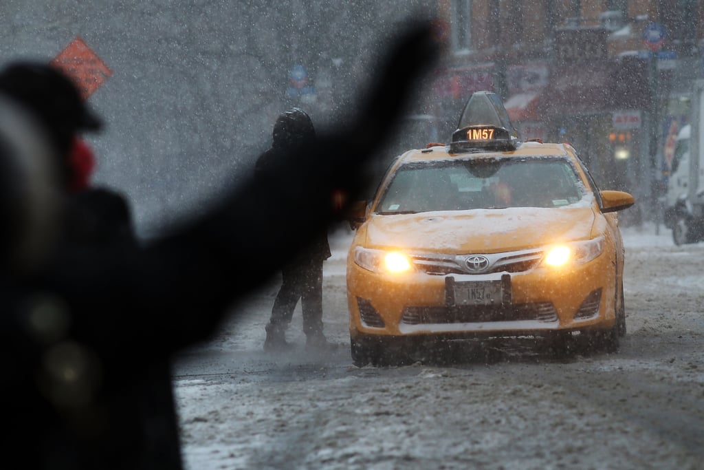 A New Yorker tried to hail a cab in the middle of the snowstorm.