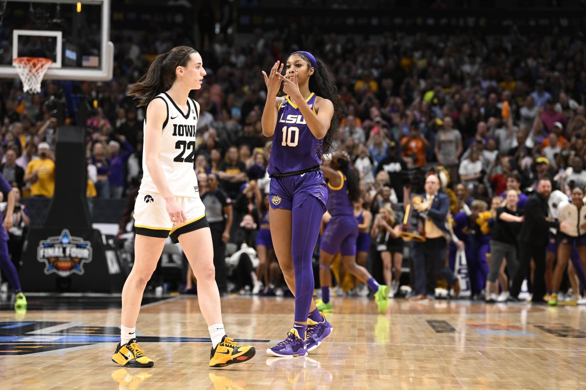 College Basketball: NCAA Finals: LSU Angel Reese (10) taunting Iowa Caitlin Clark (22) and pointing to her ring finger after winning championship game vs Iowa at American Airlines ArenaDallas, TX 4/2/2023CREDIT: Greg Nelson (Photo by Greg Nelson /Sports Illustrated via Getty Images) (Set Number: X164332 TK2)