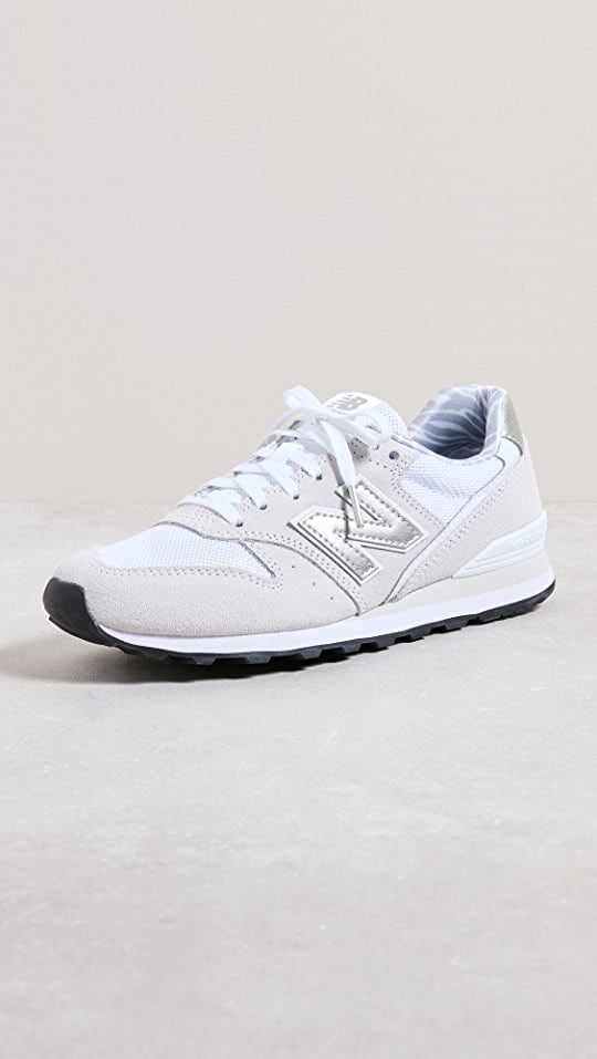 New Balance 996 Sneakers ($100)
We like these sneakers because they can be worn for both walking around and working out. If you feel like getting some movement in, it's nice to have a pair of sneakers on your beach vacation. Wear them on the plane, so you don't have to pack them!