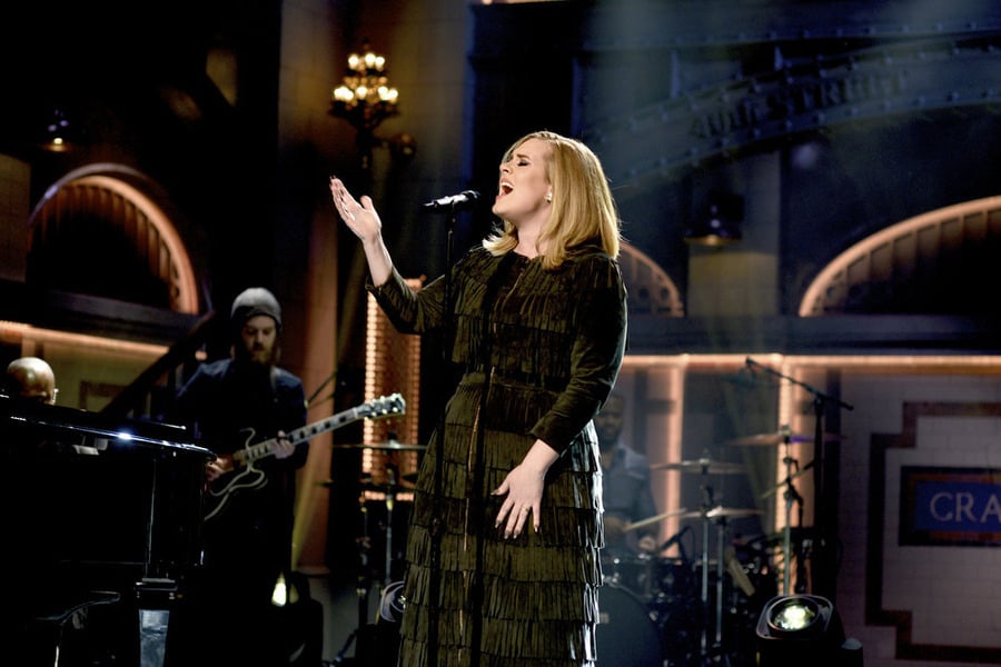 The suede material of her dress looked luxe, catching just the right light on stage.