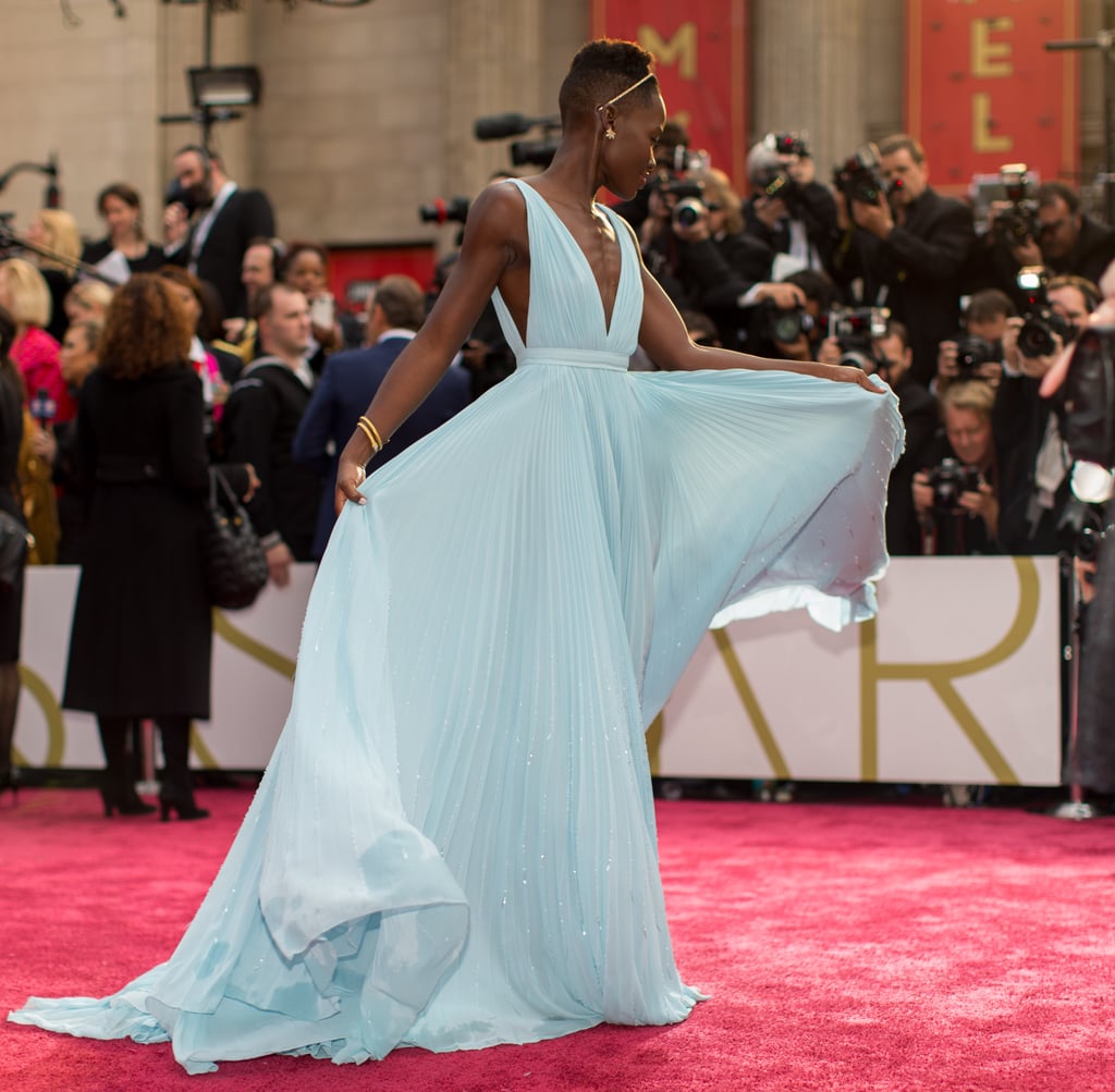 Lupita Nyong'o and her gorgeous blue Prada gown floated down the carpet.