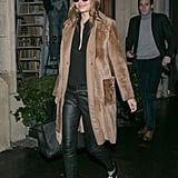 For a wintry outing in Paris, she picked a light brown furry coat to top her GENETIC leather pants. We love the two-tone flats, too!