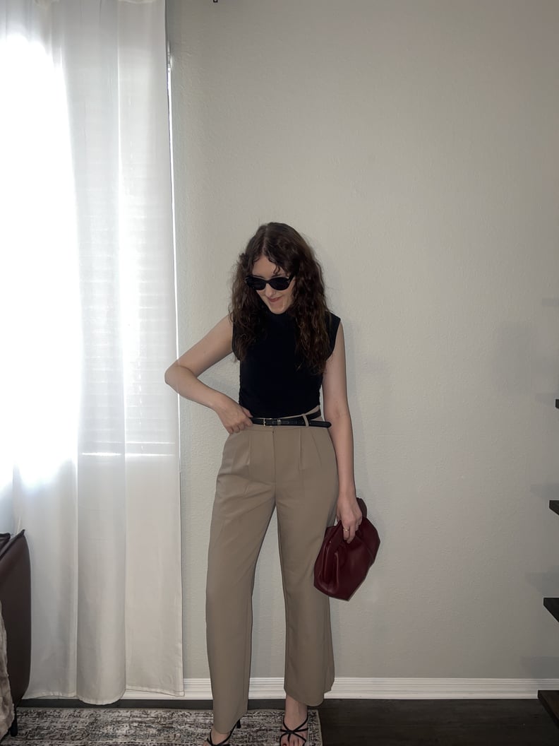 woman posing in the abercrombie a&f sloane tailored pants