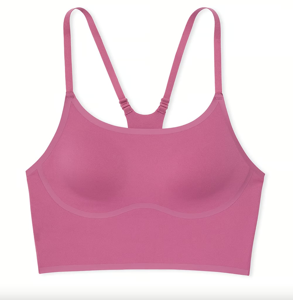 VS Pink Relay Racerback Sports Bra ($25, originally $30)
Tired of a too-tight band and straps digging in? This pick is perfect for you. Our editors deem this product one of the most comfortable sports bras out there. It's perfect for low- to medium-impact workouts, like Pilates or weight training. It features breathable, sweat-wicking fabric, along with both wireless and seamless coverage. You can read more about the style in our review of the VS Pink Relay Activewear.
Editor Quote: "I recently took up running, and it can be tough to find a cute, functional workout set I genuinely look forward to wearing (at 6 a.m. no less). Thankfully, this VS Pink set checks all the boxes. The material is lightweight and buttery, à la some of the pricier athleisure brands in my collection, and both pieces held up well through a quick morning jog and follow-up leg day at the gym. I was a big fan of the high-waisted design and side pockets on either side of the Relay leggings, and the Relay contour bra felt perfectly supportive. If you're looking for a flattering workout set that feels as good as it looks, this one definitely gets my vote." — Chandler Plante, health & fitness staff writer and social producer