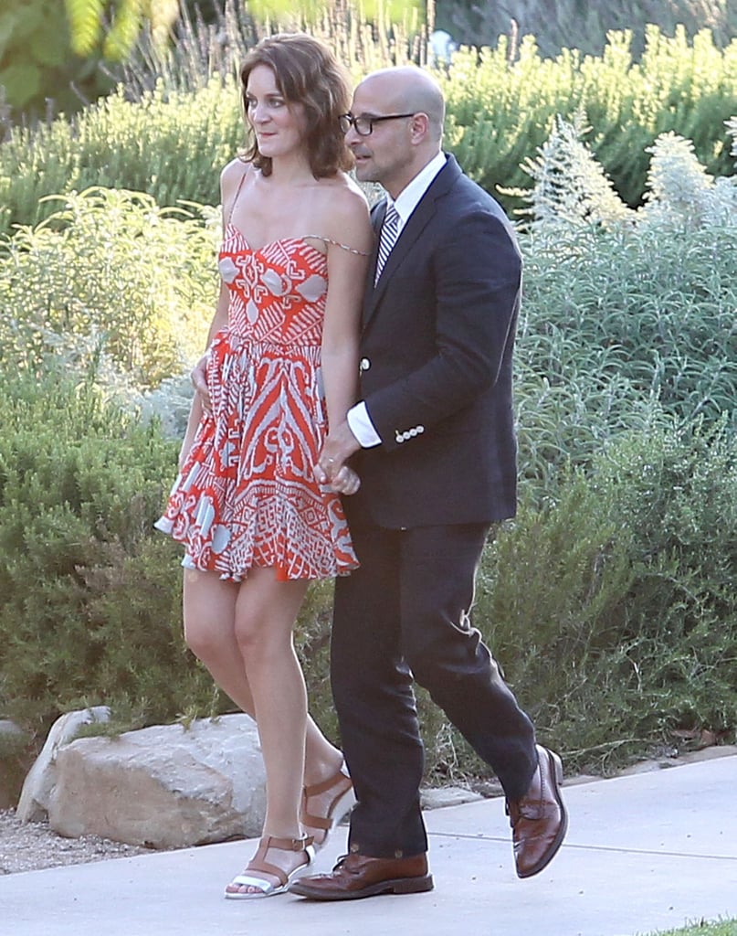 Felicity Blunt went flirty in an orange, printed, flowy minidress and low wedge sandals at Jimmy Kimmel's wedding in July. Follow suit by matching a fun printed number with strappy wedges.