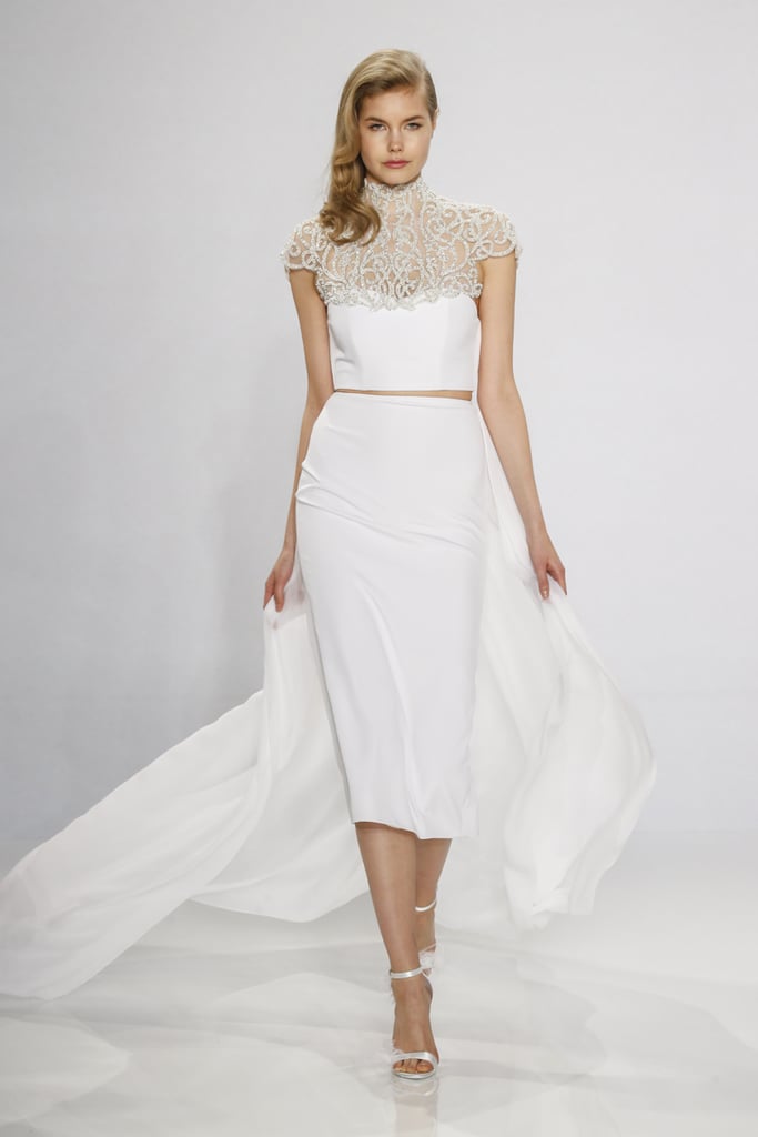 Embroidered collar and strapless cropped dress with train.