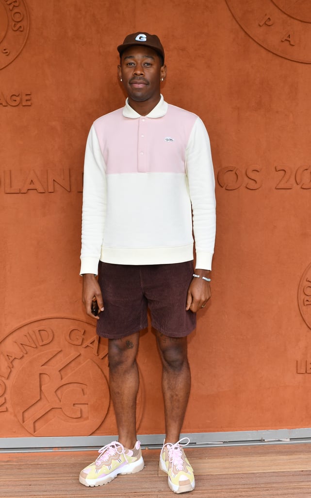 At the 2019 French Tennis Open, Tyler wore a Lacoste shirt he designed with a pair of matching pink sneakers.