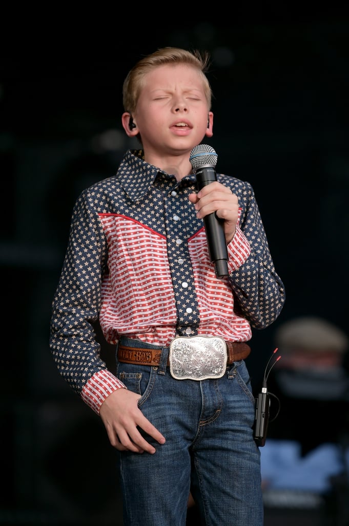 If you're looking to create a red, white, and blue Walmart Yodel Boy look, then Mason's Fourth of July outfit should do the trick. Stick with all the regular basics here, but swap the white shirt for a button-up that pays tribute to the American flag.