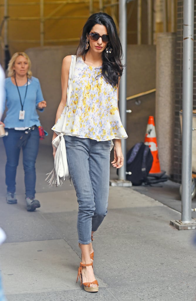Going for the boho look in cropped gray skinnies, a flouncy Giambattista Valli trapeze top, Valentino wedges, and a fringed B-Low the Belt bag.