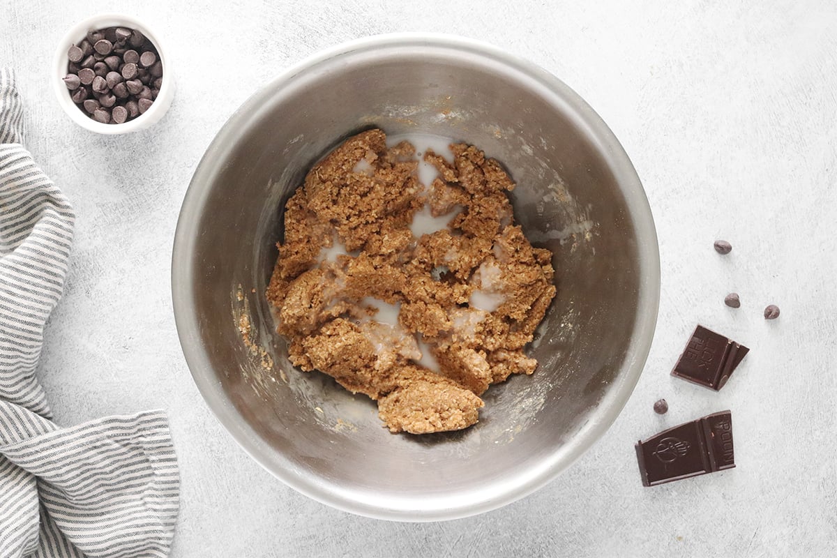 Adding milk to cookie dough