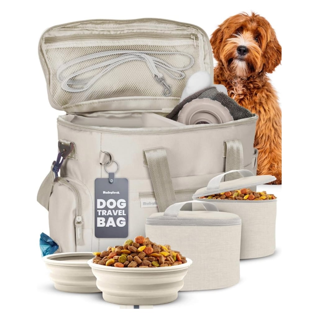 Rubyloo Dog Travel Bag ($52, originally $55)
Once we added a second dog to our family, we realized that traveling without a dedicated piece of luggage for them was no longer an option. This bag from Rubyloo has been a godsend — it has both internal and external pockets for keeping things organized, a removable divider I use to separate food and medications from other items, a water bottle pocket, and even a poop bag dispenser for easy access. Plus, it comes with two food containers that can hold up to eight cups each, and two collapsible bowls for feeding on-the-go.