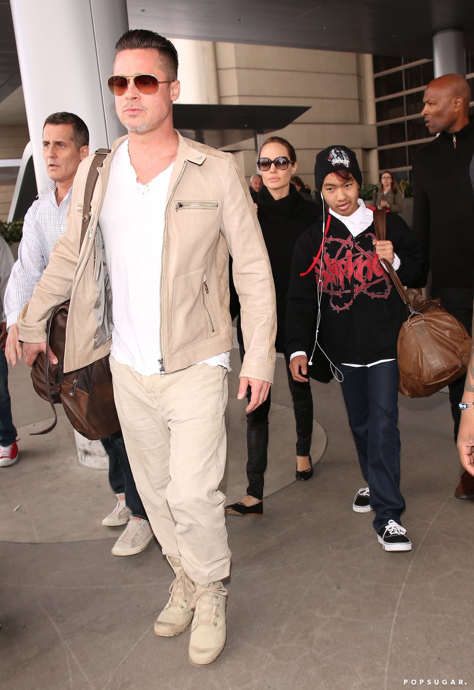 Angelina Jolie and her son Maddox Jolie-Pitt arriving at LAX