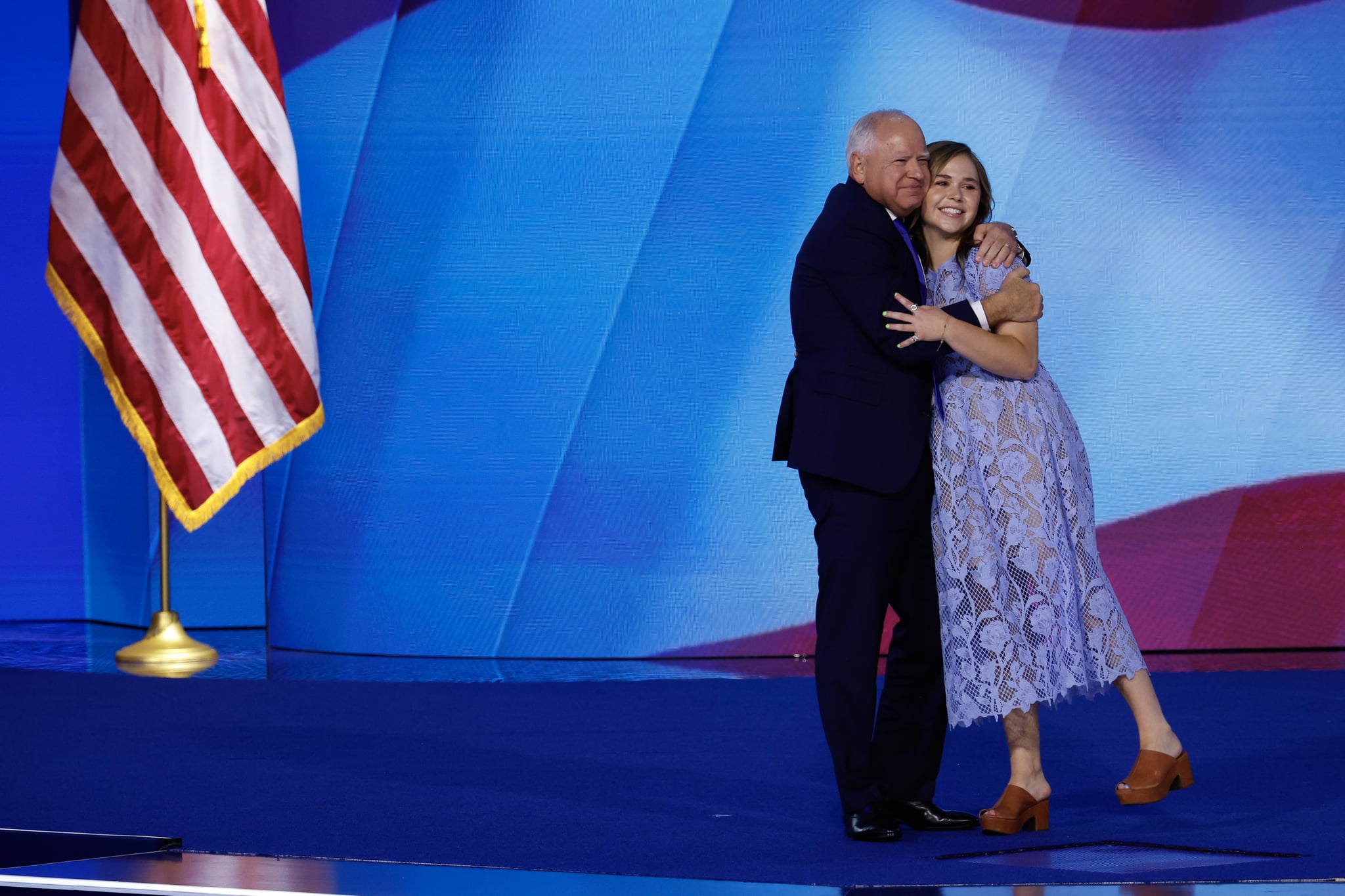 CHICAGO, ILLINOIS - AUGUST 21: Democratic vice presidential nominee Minnesota Gov. Tim Walz celebrates with his daughter Hope Walz after accepting the Democratic vice presidential nomination on stage during the third day of the Democratic National Convention at the United Center on August 21, 2024 in Chicago, Illinois. Delegates, politicians, and Democratic Party supporters are in Chicago for the convention, concluding with current Vice President Kamala Harris accepting her party's presidential nomination. The DNC takes place from August 19-22.   (Photo by Chip Somodevilla/Getty Images)