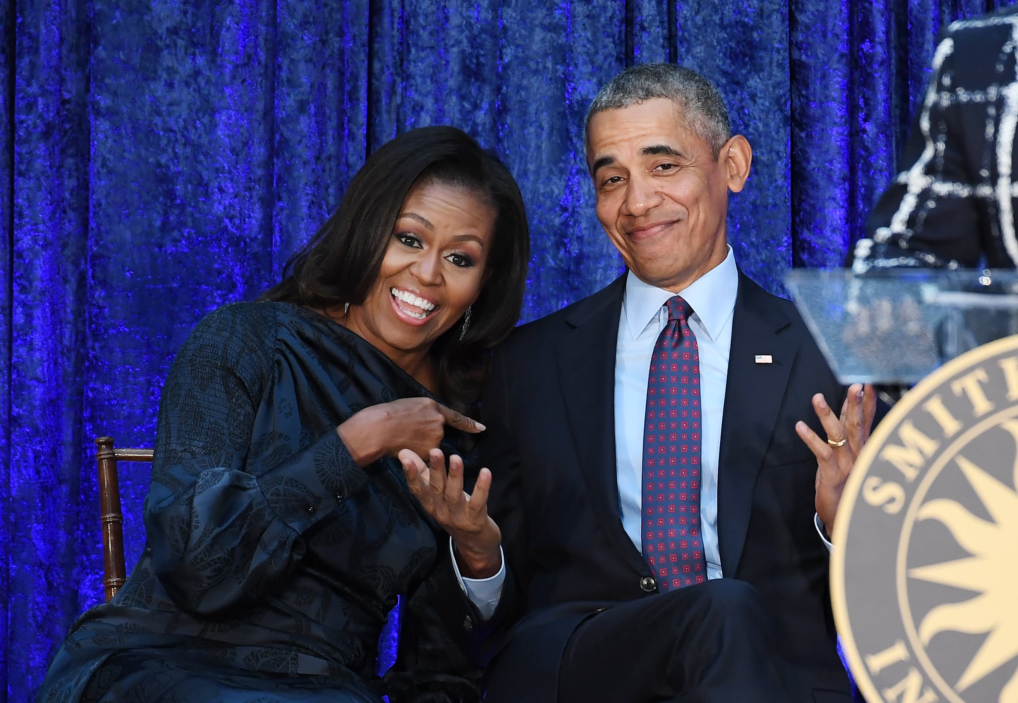 WASHINGTON, DC - FEBRUARY 12: Former First Lady Michelle Obama and former President Barack Obama are seen after their portraits were unveiled at the Smithsonian National Portrait Gallery on Monday February 12, 2018 in Washington, DC. The former President's portrait was painted by Kehinde Wiley while the former First Lady's portrait was painted by Amy Sherald. (Photo by Matt McClain/The Washington Post via Getty Images)