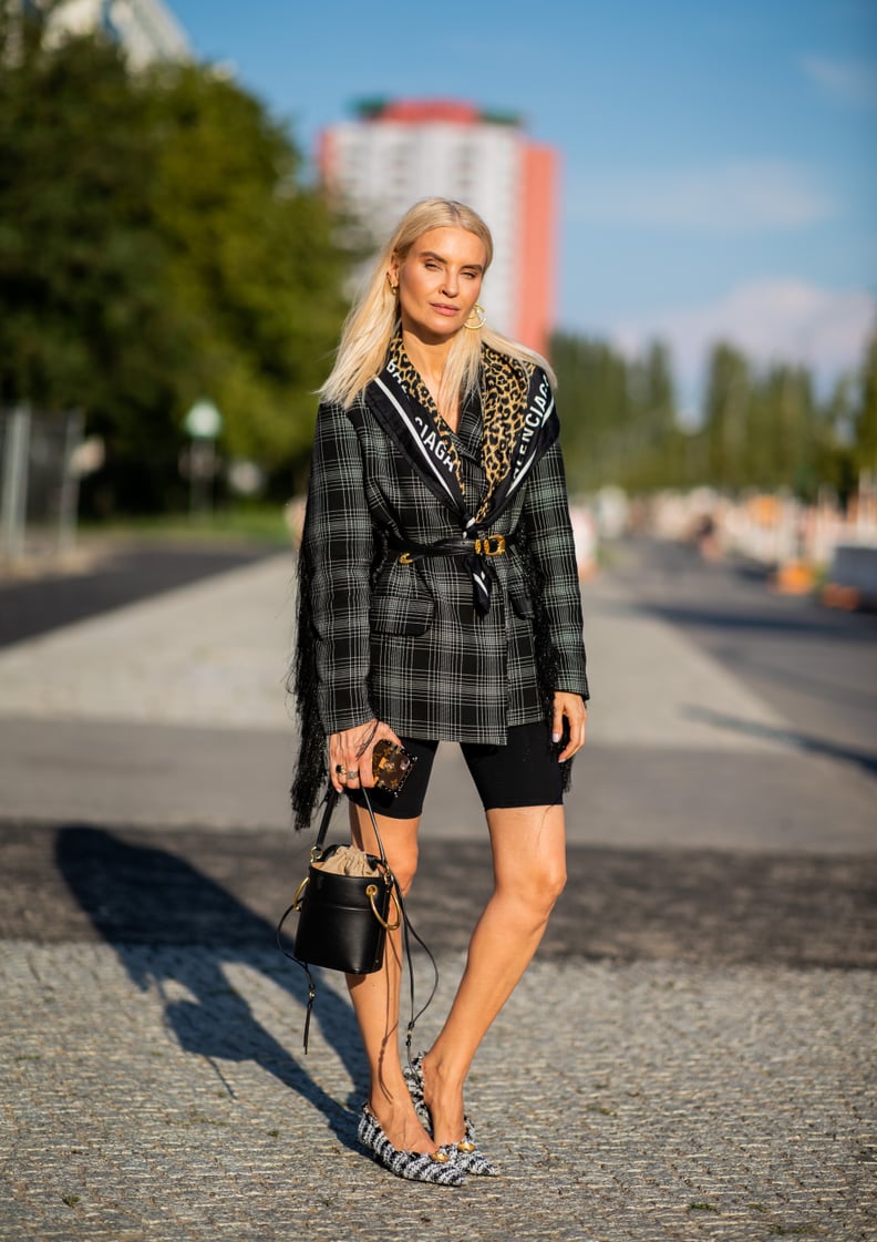 A plaid blazer really ties together casual pieces like biker shorts.
